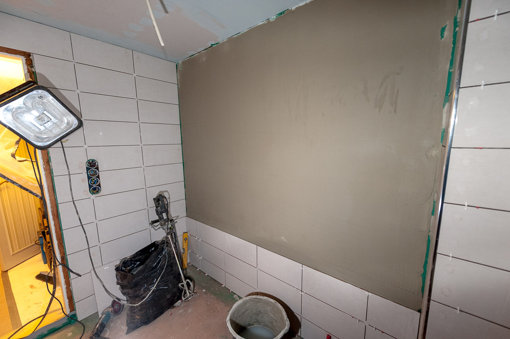 Wall above where the bath will stand still to be done