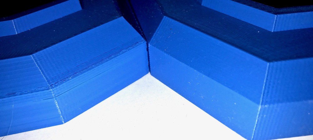 Close-up of the base parts showing the rear (left) and front (right) Close-up of the base parts showing the rear (left) and front (right)
